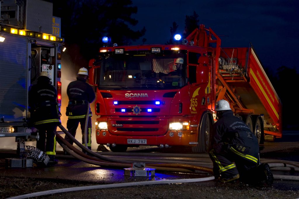 Scania P 380 6x2*4 Rescue vehicle. Multipurpose fire vehicle in front of a forest fire. Photo: Dan Boman 2008